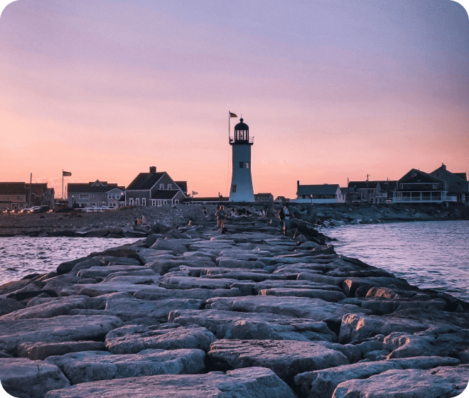 lighthouse on cobble path